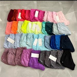 MYSTERY LULULEMON & MORE BOX THAT WILL INCLUDE A NWT LULULEMON BELT BAG
